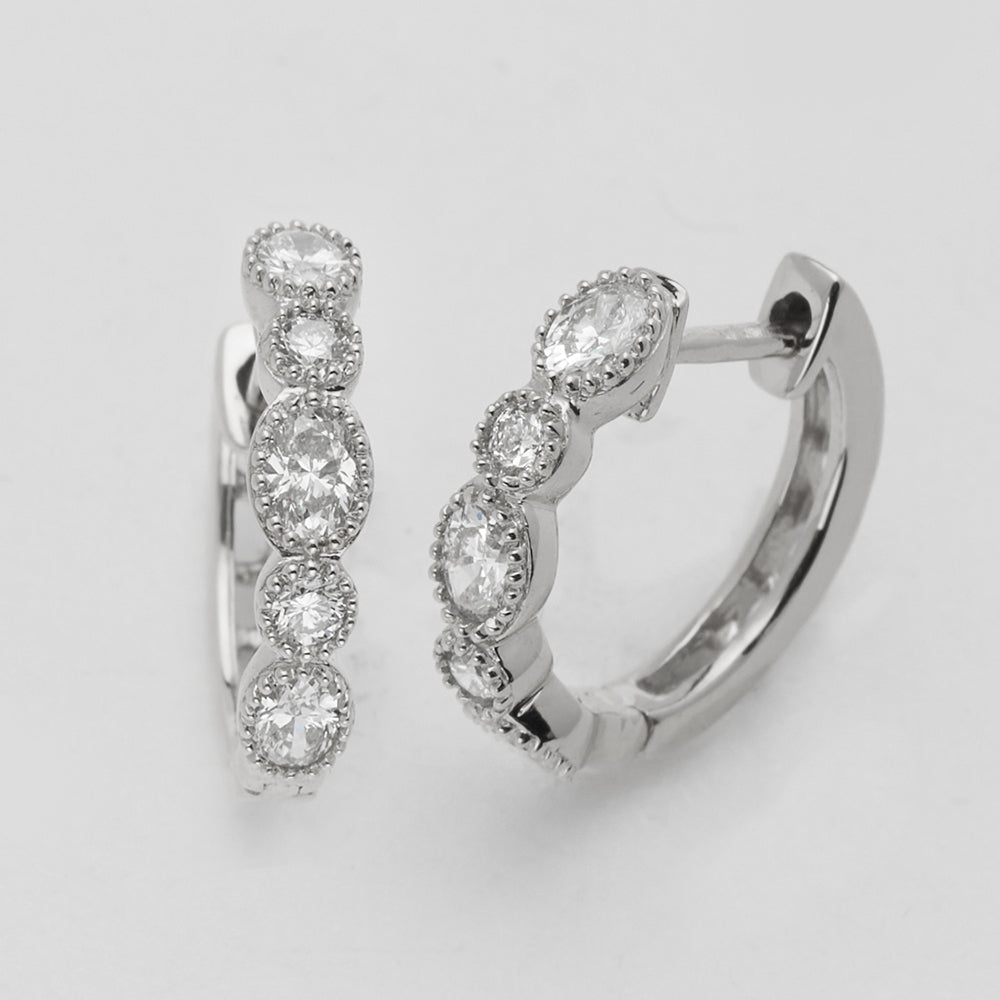 14KW 0.80CTW OVAL AND ROUND DIAMOND BEZEL SET HOOP